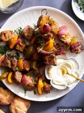A plate of grilled steak skewers.