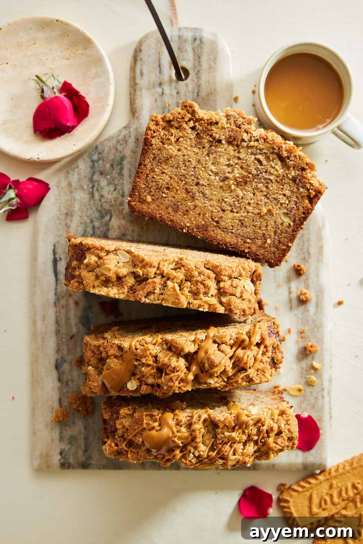 A beautifully sliced loaf of Biscoff Banana Bread, showing a moist and well-risen interior.