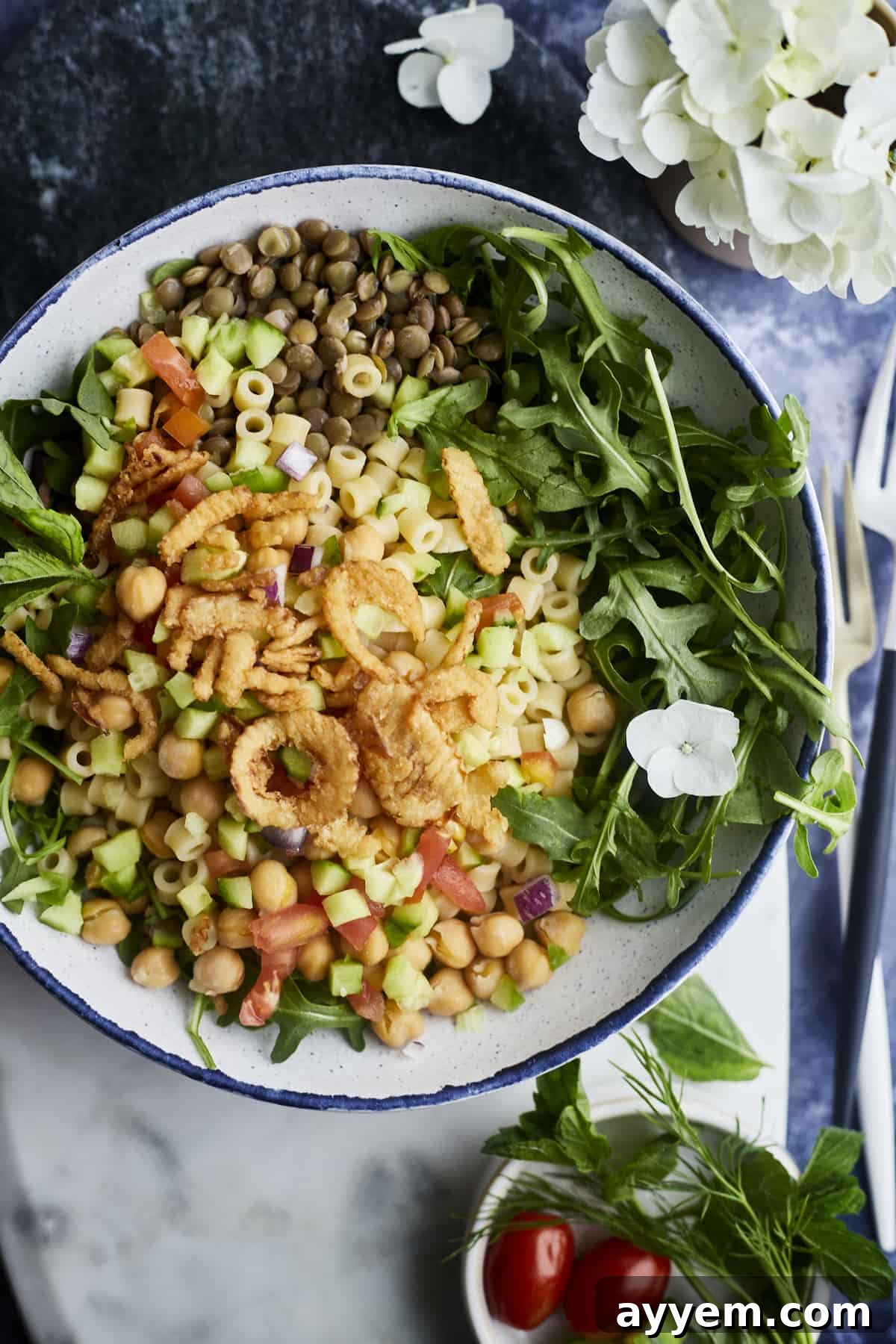 A bowl of Koshary Salad, a healthy and vibrant take on the classic Egyptian dish, perfect as a refreshing Ramadan side.