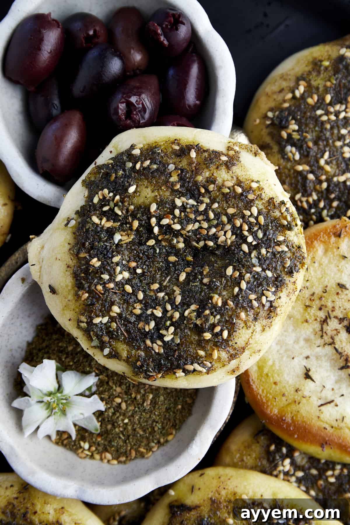 A vibrant selection of Middle Eastern dishes, including flavorful manakeesh, perfect as nourishing and satisfying Ramadan food ideas for Iftar.