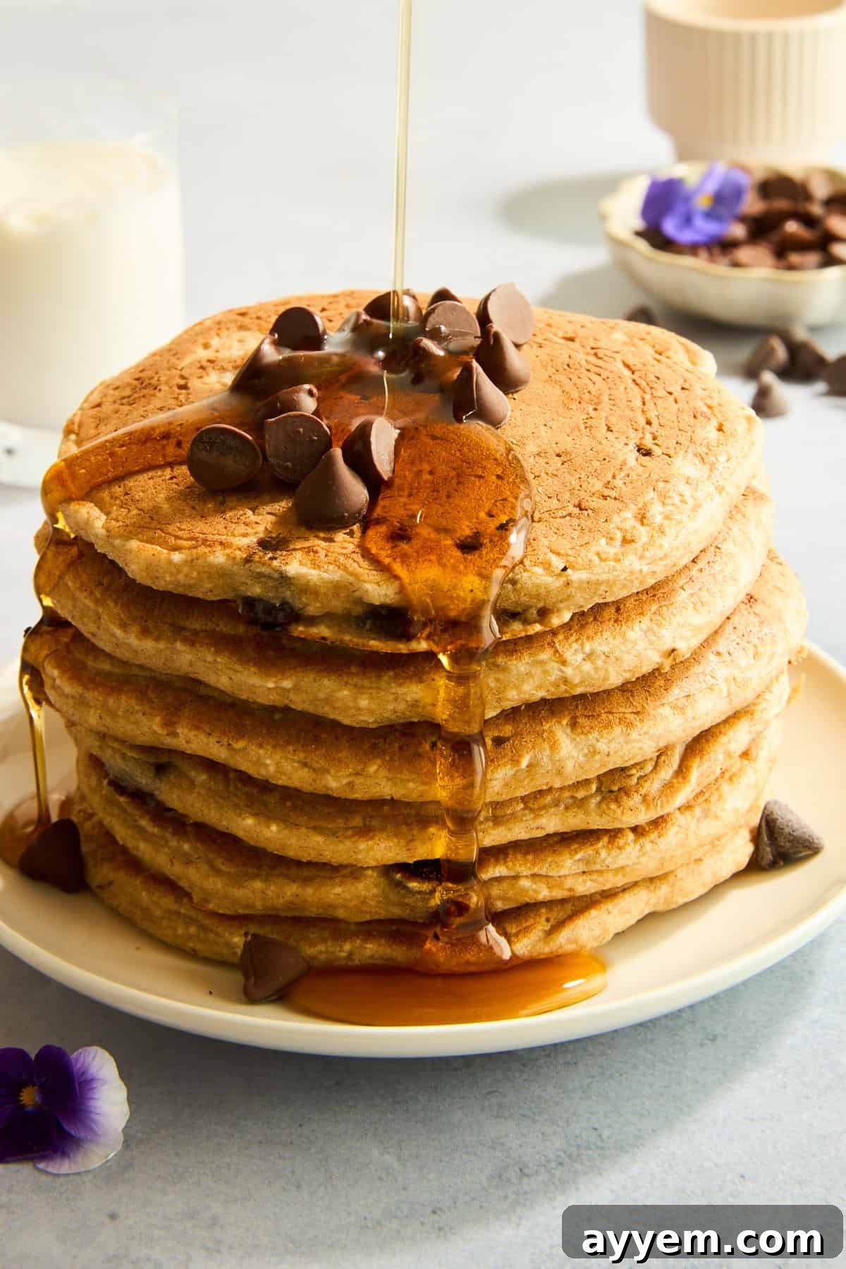 A stack of chocolate chip protein pancakes.
