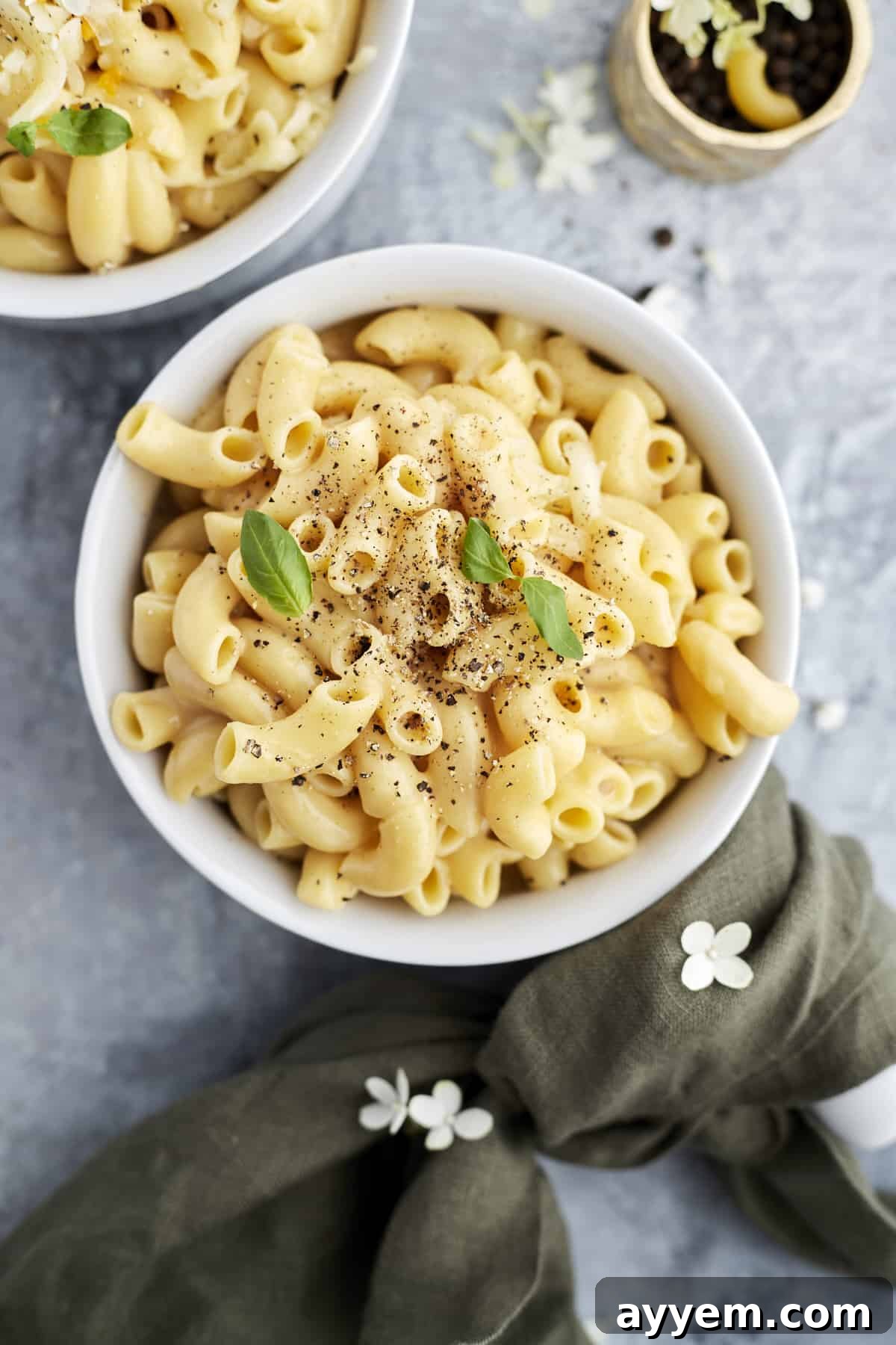 Overhead image of a bowl of one pot mac and cheese, highlighting its creamy texture.